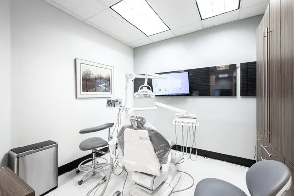 A dental exam chair inside an exam room at Torrance Dental Center