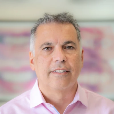 A headshot photo of dentist Kamran Rafie from Torrance Dental Center