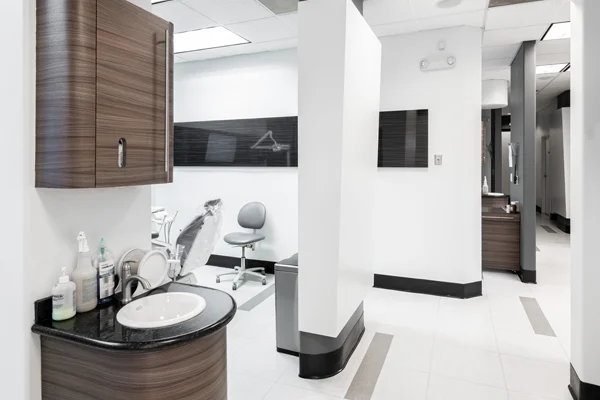 The hallway at Torrance Dental Center. Outside the exam rooms, there is a handwashing station.